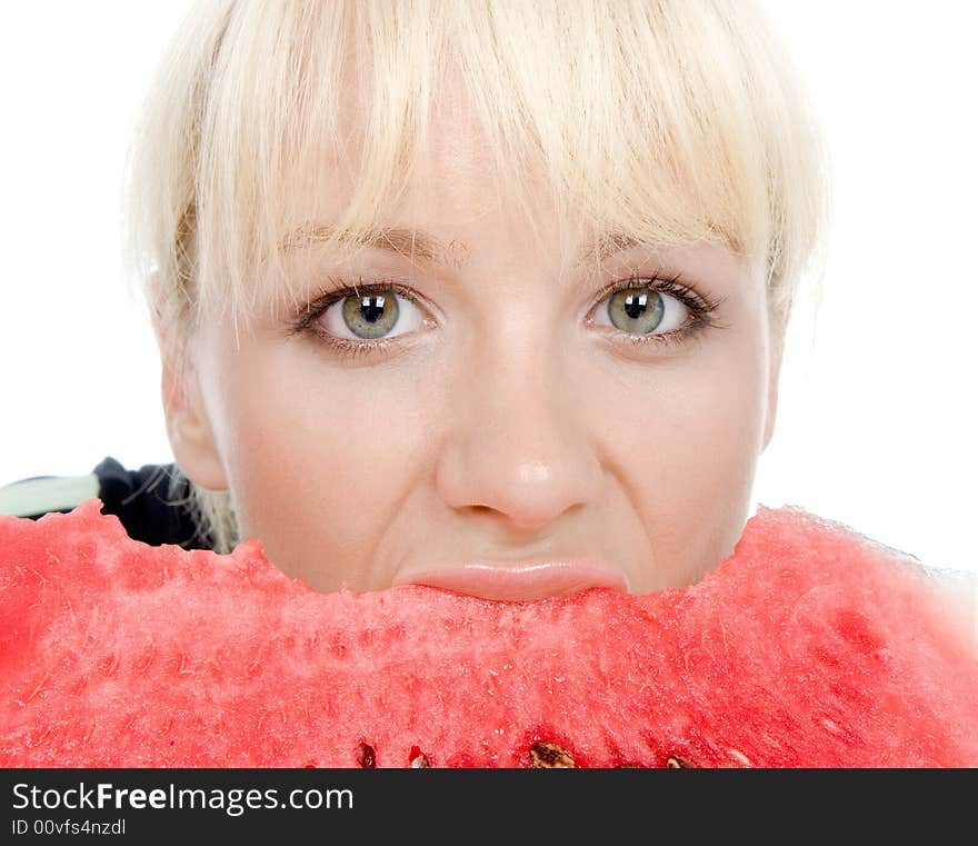 Beautiful green-eyes blondy eating sweet water-melon. Beautiful green-eyes blondy eating sweet water-melon