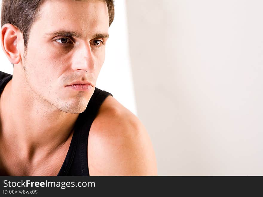 Young man portrait in the studio on a white background. Young man portrait in the studio on a white background