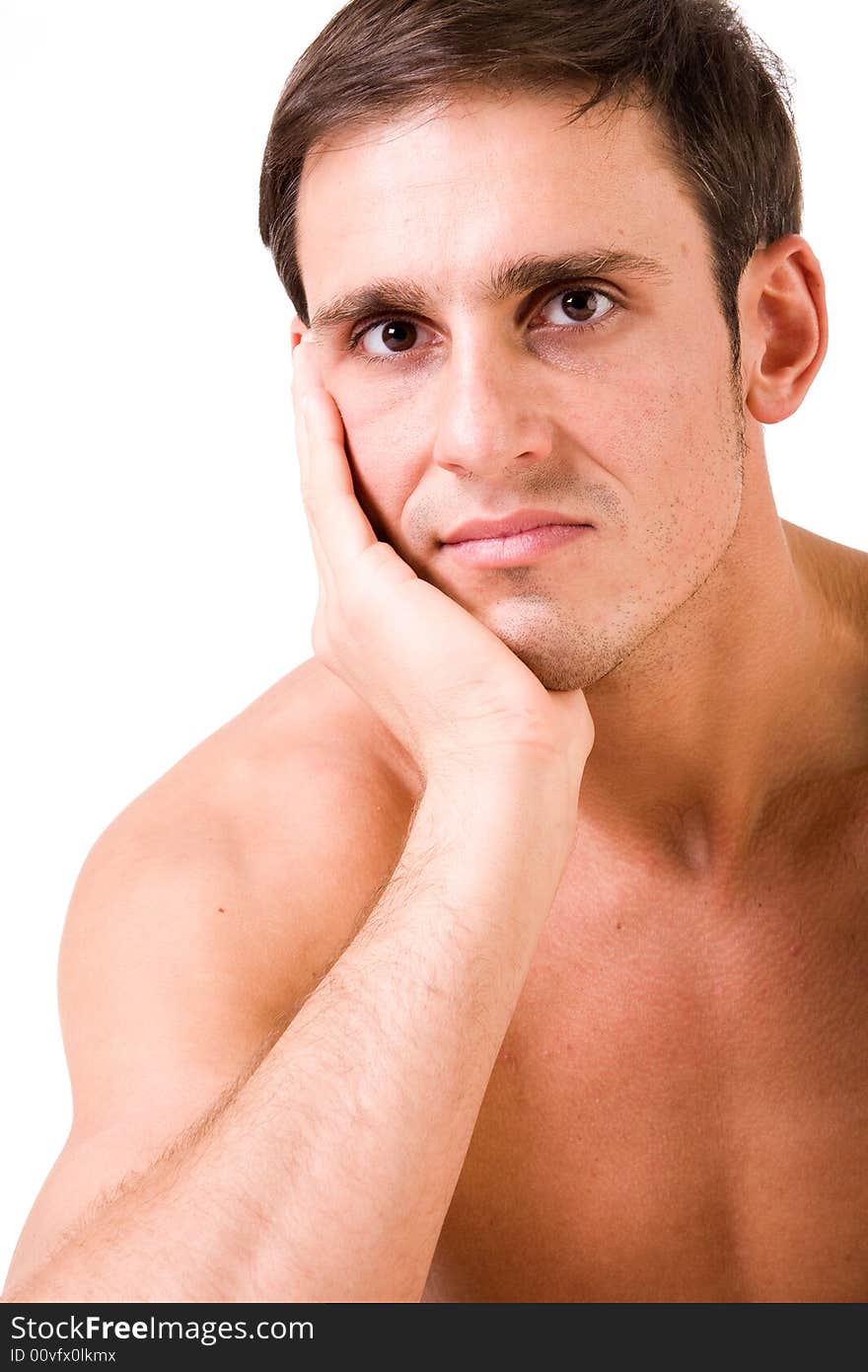 Young man portrait in the studio on a white background. Young man portrait in the studio on a white background