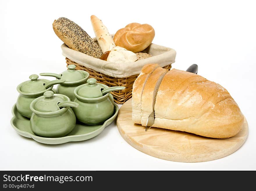 Breakfast with bread and other pastries on the table