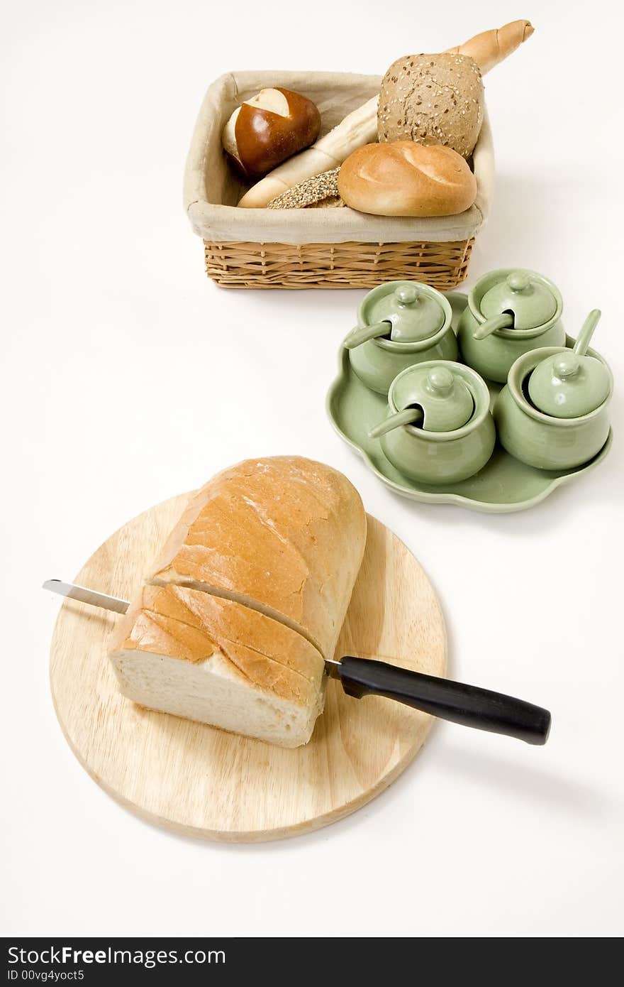 Breakfast with bread and other pastries on the table