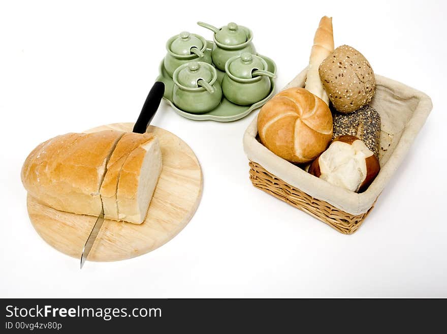 Breakfast with bread and other pastries on the table