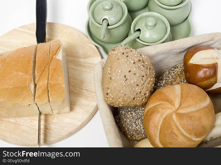 Breakfast with bread and other pastries on the table