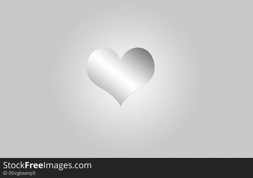 Silver heart on gray background