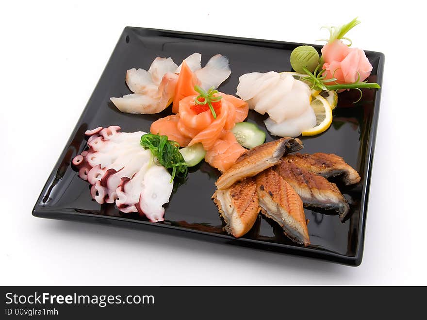 Made dish of sashimi on white