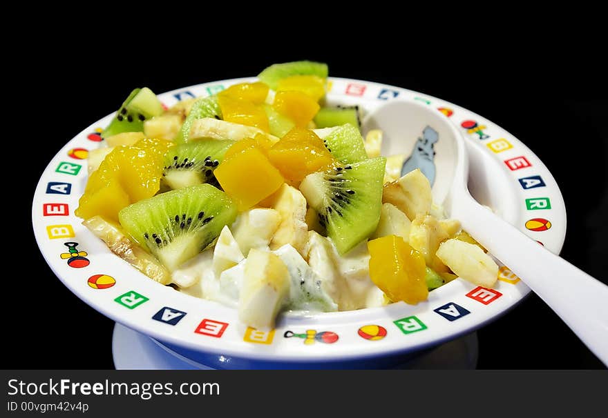 Fruit Salad In A Plate On A Black Background