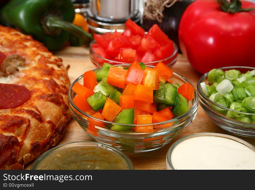 Bowl of Green and Orange Bell Peppers Chopped