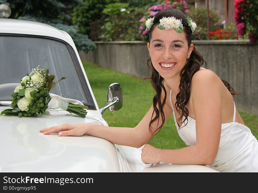 Young bride posing in the wedding day. Young bride posing in the wedding day