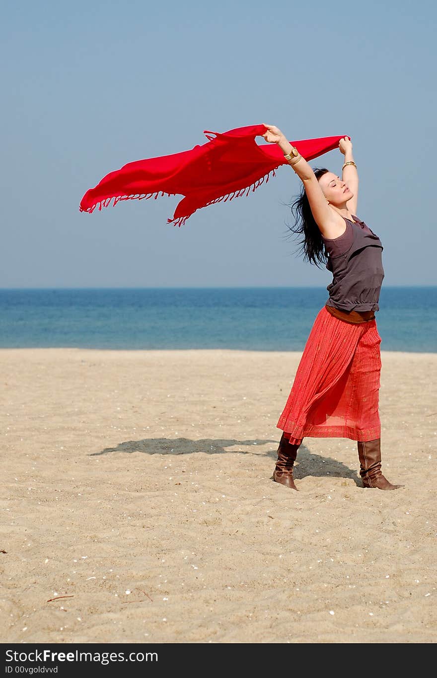 Attractive brunette woman on the beach. Attractive brunette woman on the beach