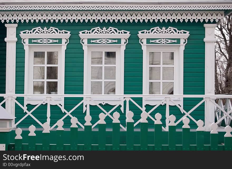 Wall of ancient house. Woodcarving