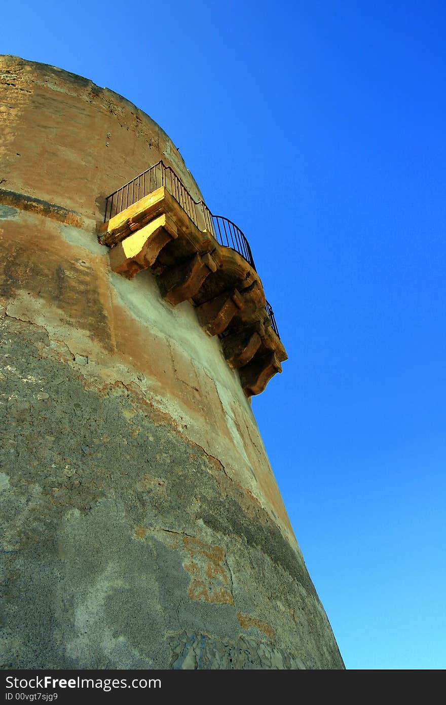 Ancient Tuna fishing construction Tonnara Bordonaro XVI century in Palermo. View on Mount Pellegrino blue sky and sea. Island of Sicily, Italy. Ancient Tuna fishing construction Tonnara Bordonaro XVI century in Palermo. View on Mount Pellegrino blue sky and sea. Island of Sicily, Italy