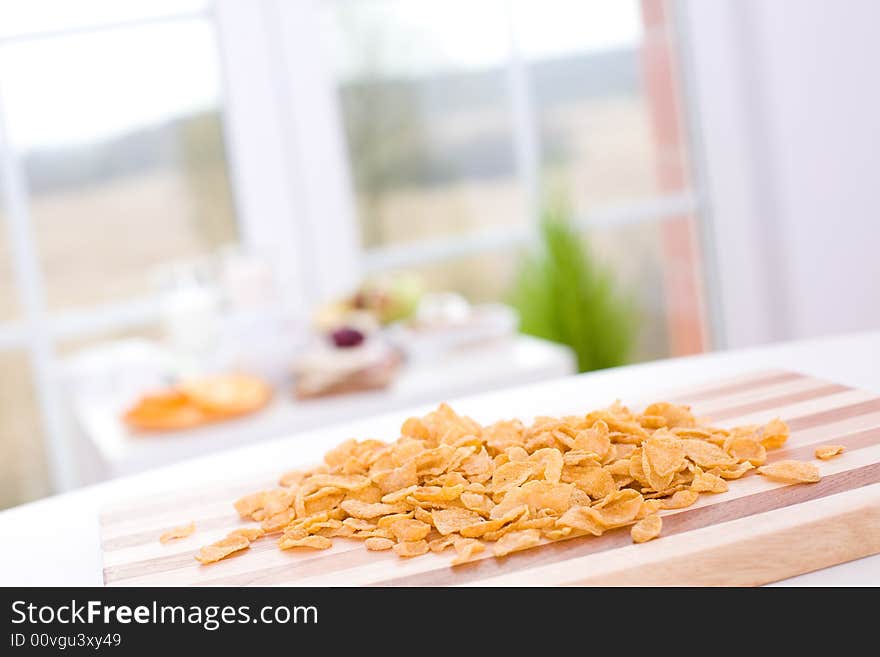 Cornflakes on the board / in the kitchen. Cornflakes on the board / in the kitchen