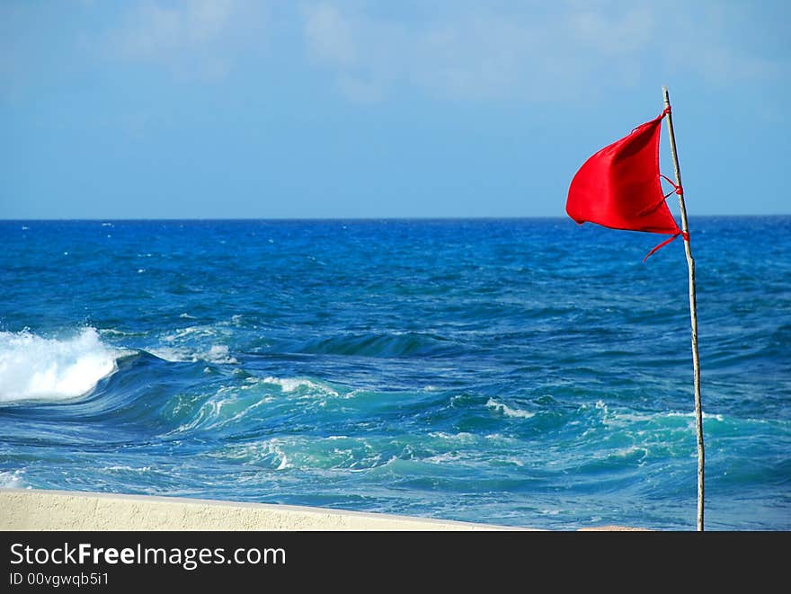 A red flag that indicates if you can get into the sea. A red flag that indicates if you can get into the sea