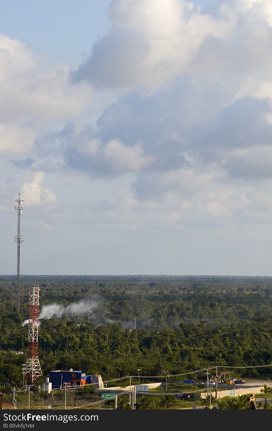 Radio tower and trees of cozumel