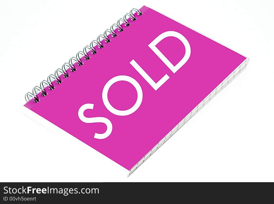 Pink notebook on a white background