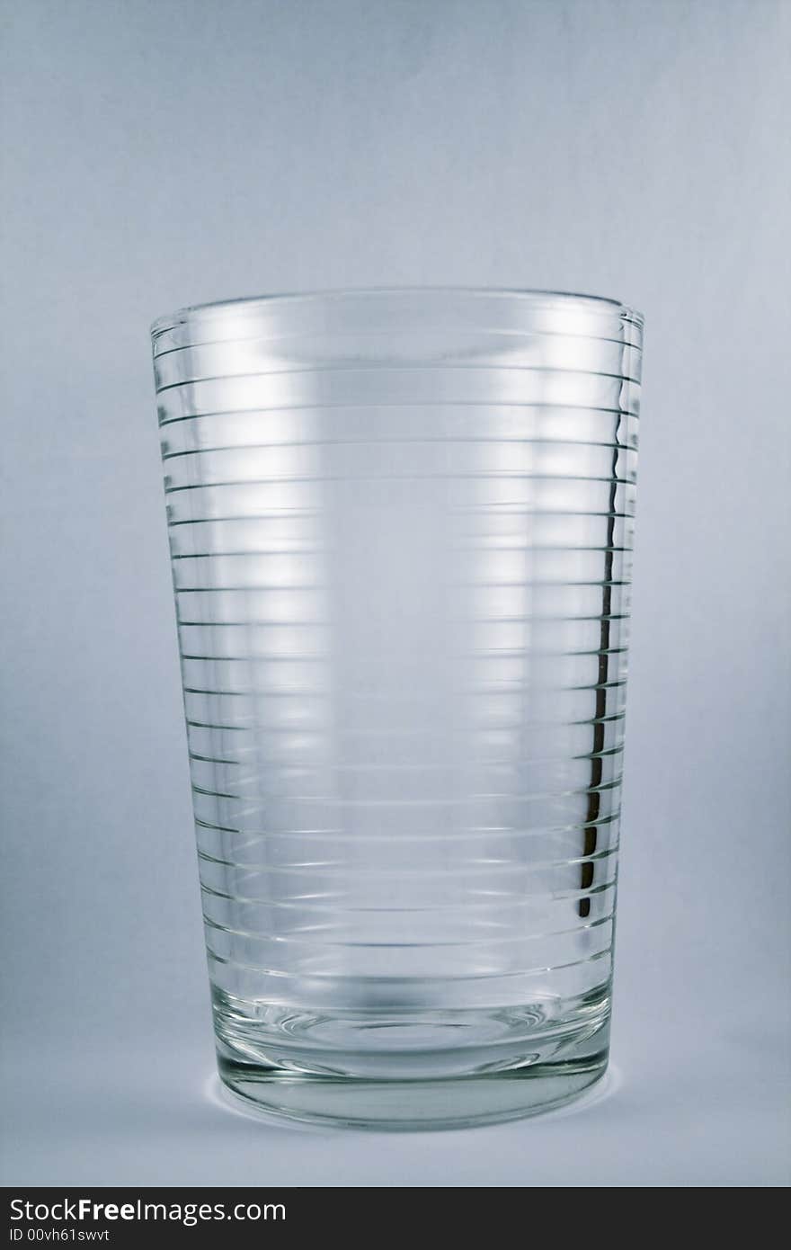 A High Glass on grey background