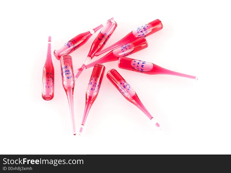 Ampoules with red liquid, isolated