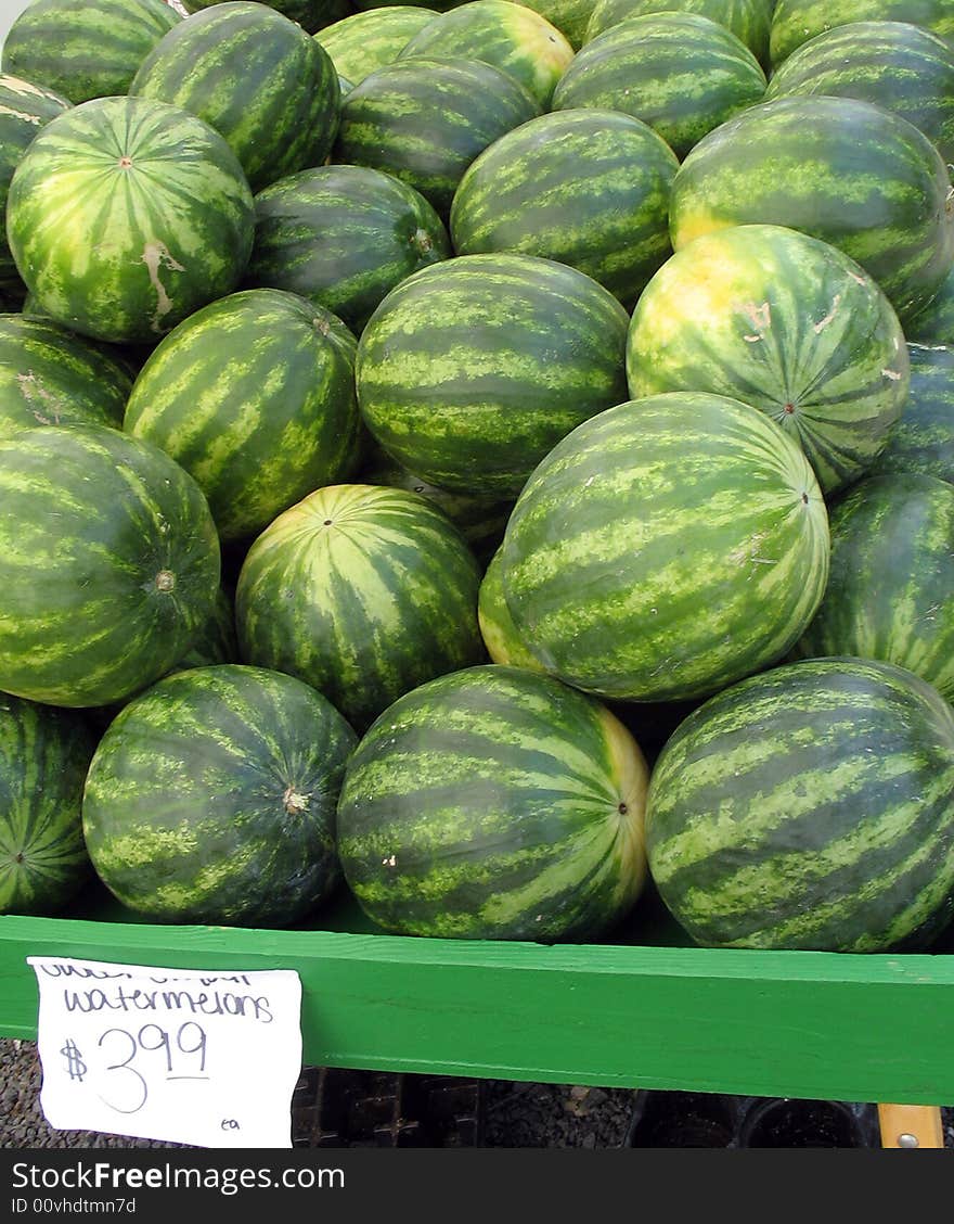 Fresh green striped watermelons in farmers' market in Carolina during April. Fresh green striped watermelons in farmers' market in Carolina during April