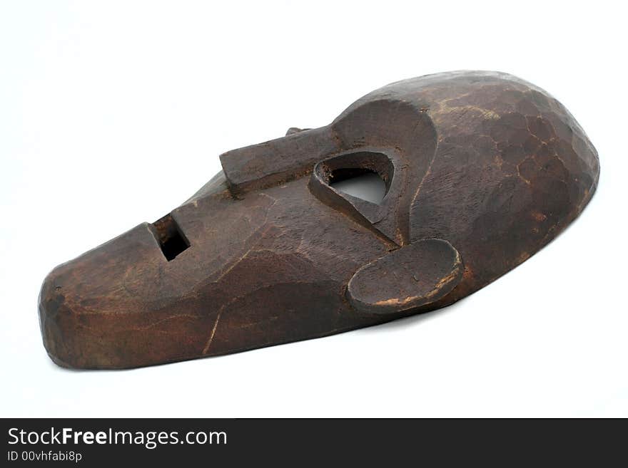 Handmade antique african mask, isolated