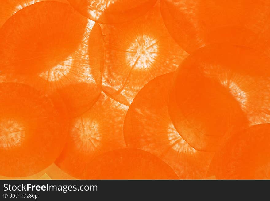 Carrot cut into thin slices. Carrot cut into thin slices