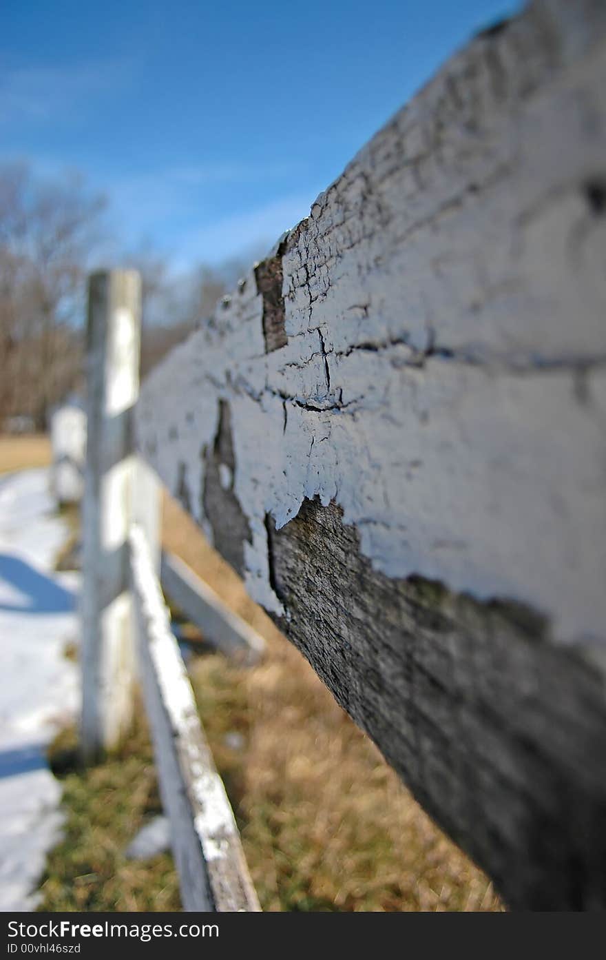 Decaying wooden fence at an abandoned horse farm