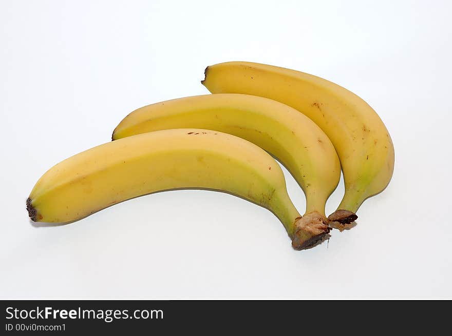 Photo of three yellow bananas