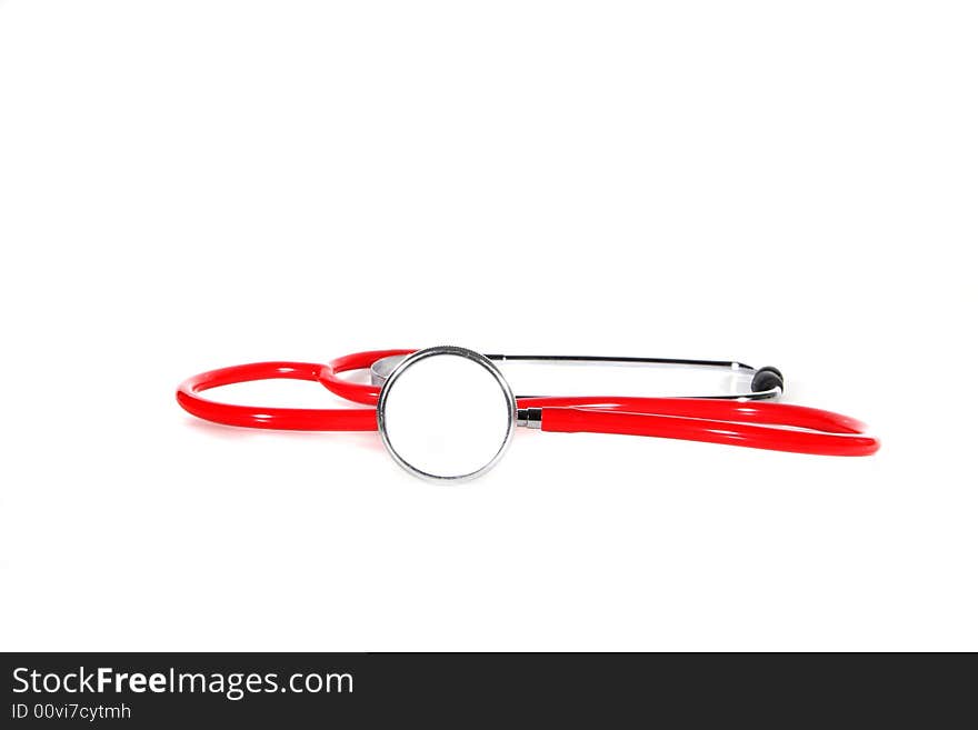 A red stethoscope over white background. A red stethoscope over white background.