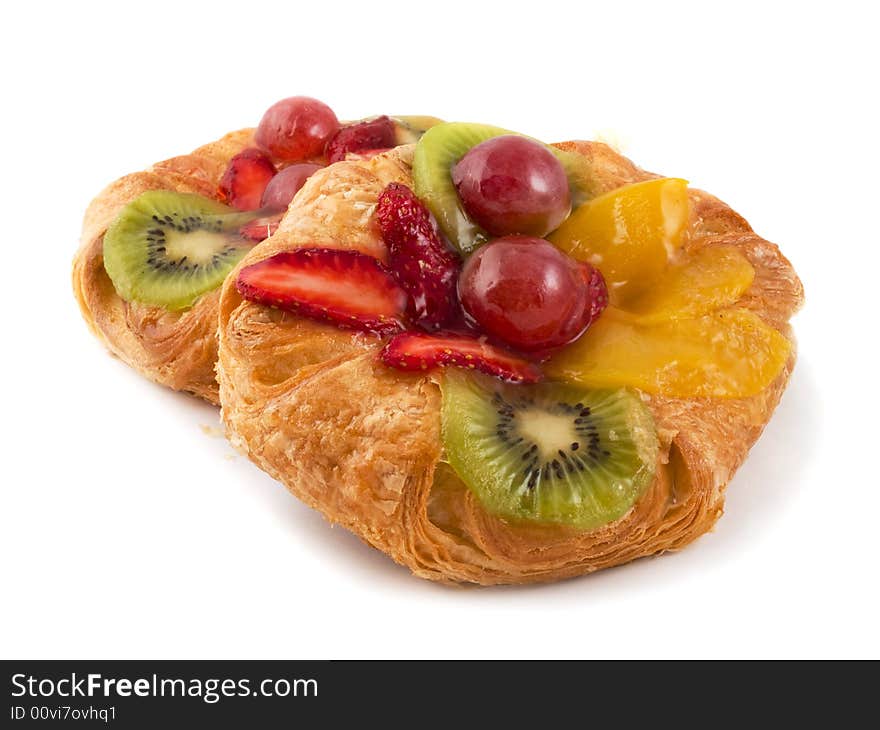 Rich rolls with fruit isolated on a white background