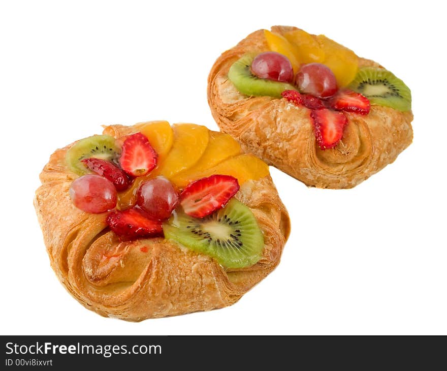 Rich rolls with fruit isolated on a white background