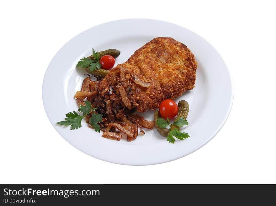 Chop, cucumber and tomatoes on white plate. Chop, cucumber and tomatoes on white plate