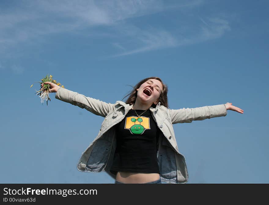 Relaxing young attractive girl, blue sky. Relaxing young attractive girl, blue sky