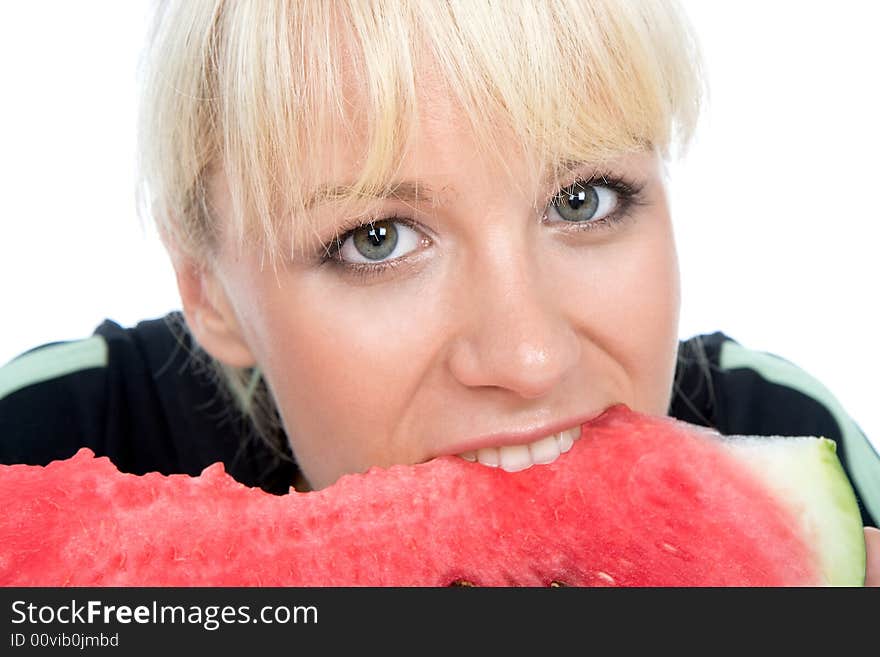 Beautiful green-eyes blondy eating sweet water-melon. Beautiful green-eyes blondy eating sweet water-melon