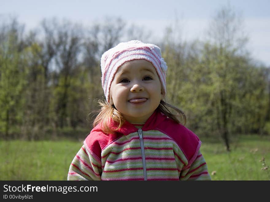 Portrait of small funny girl