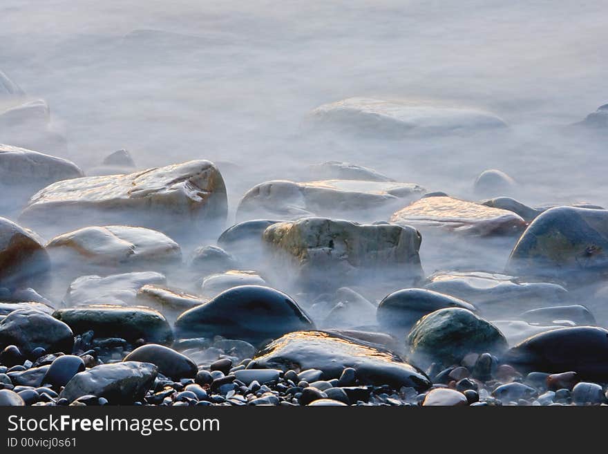 Stones on the atlantic shore after sunset. Stones on the atlantic shore after sunset