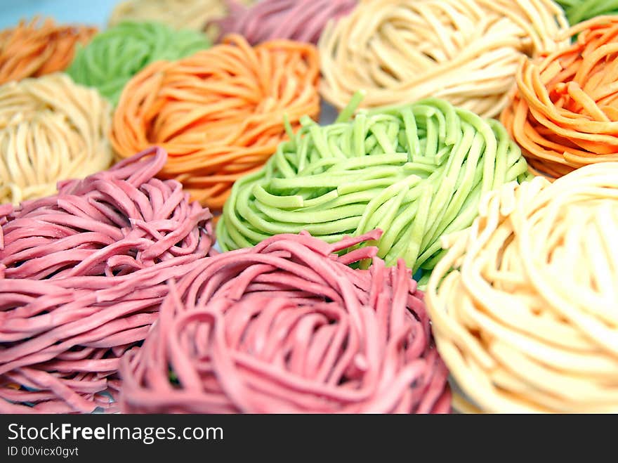 Colored pasta or colored noodles ready for cooking