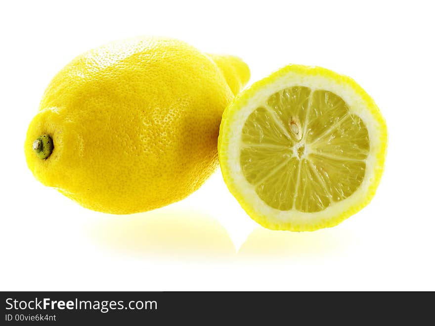 Fresh ripe lemon with a slice