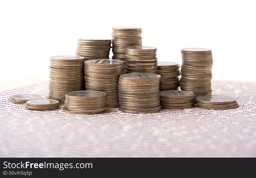 A photo of silver coins in columns