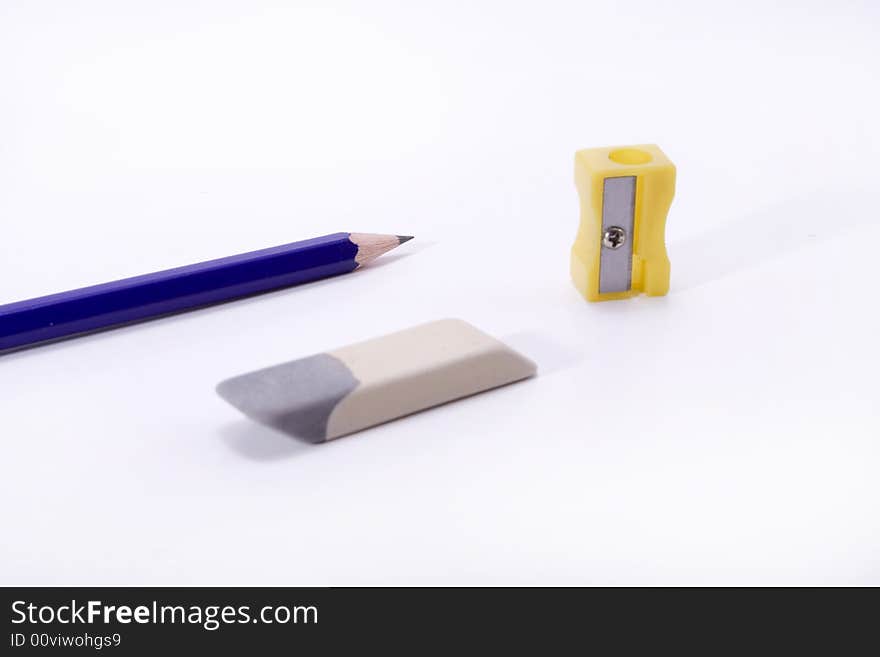 Pencile rubber and sharpener on white backgrond. Pencile rubber and sharpener on white backgrond.