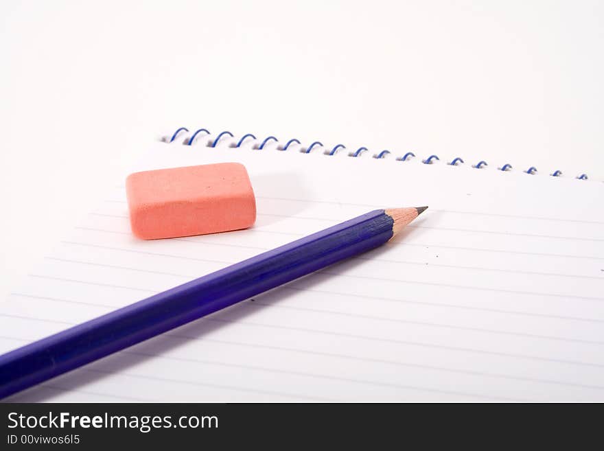 Note pad and pencile on white background. Note pad and pencile on white background.