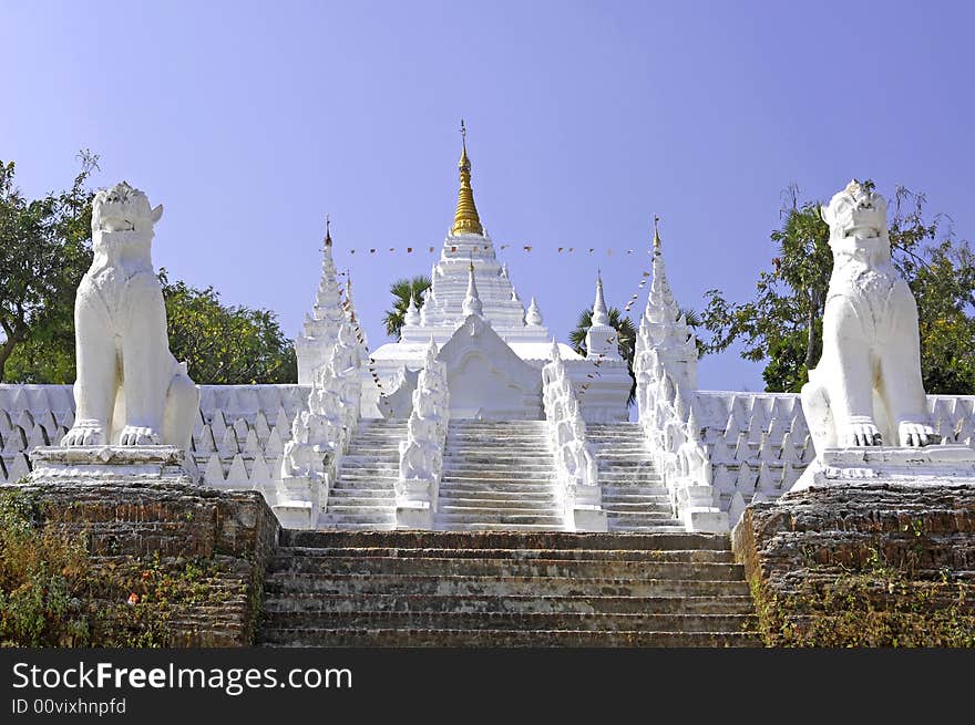 Myanmar, mingun: Statues representing seated buddha's sculptures outside the mingun pagoda. Myanmar, mingun: Statues representing seated buddha's sculptures outside the mingun pagoda