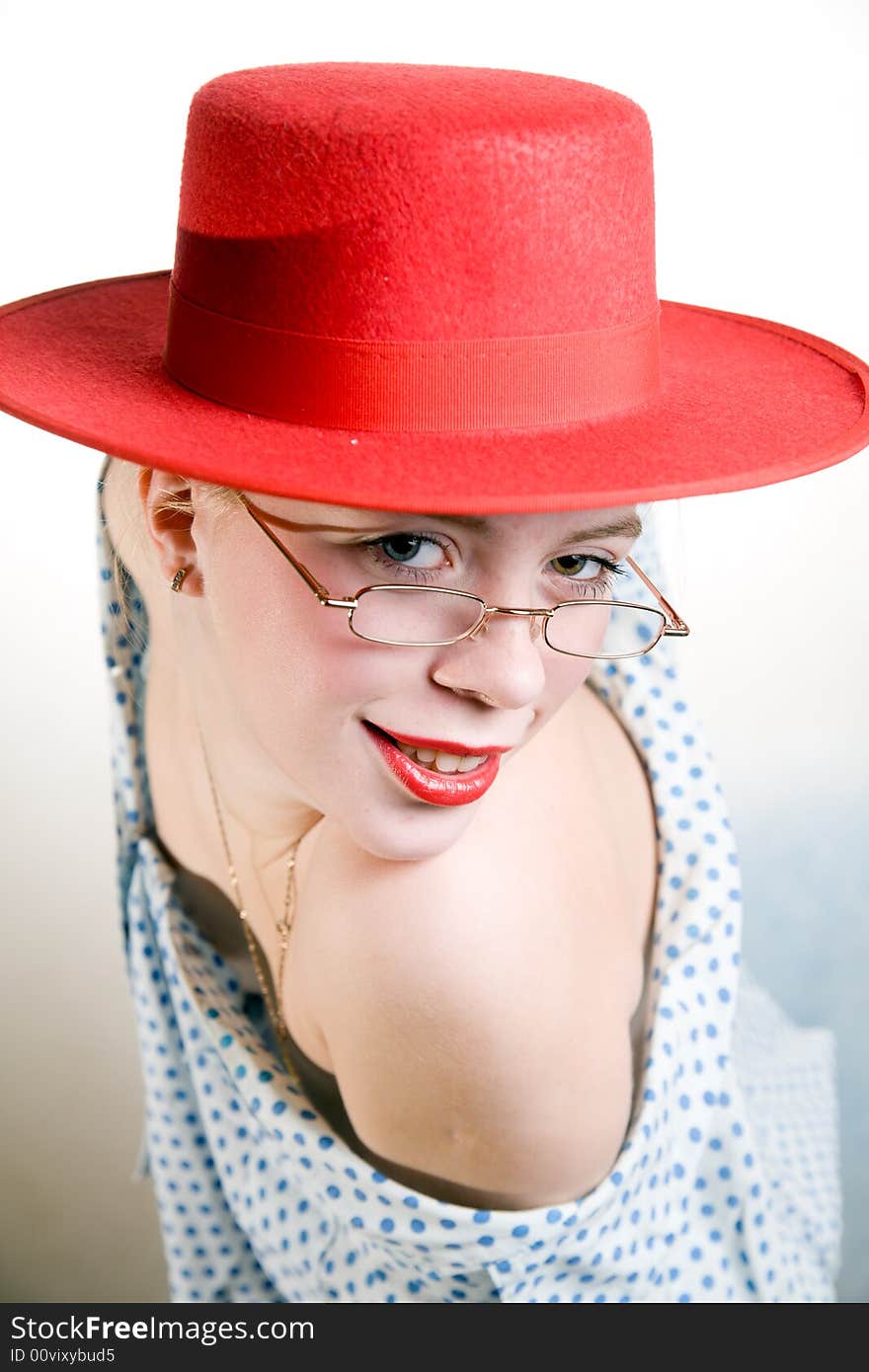 Young sexy woman in red hat