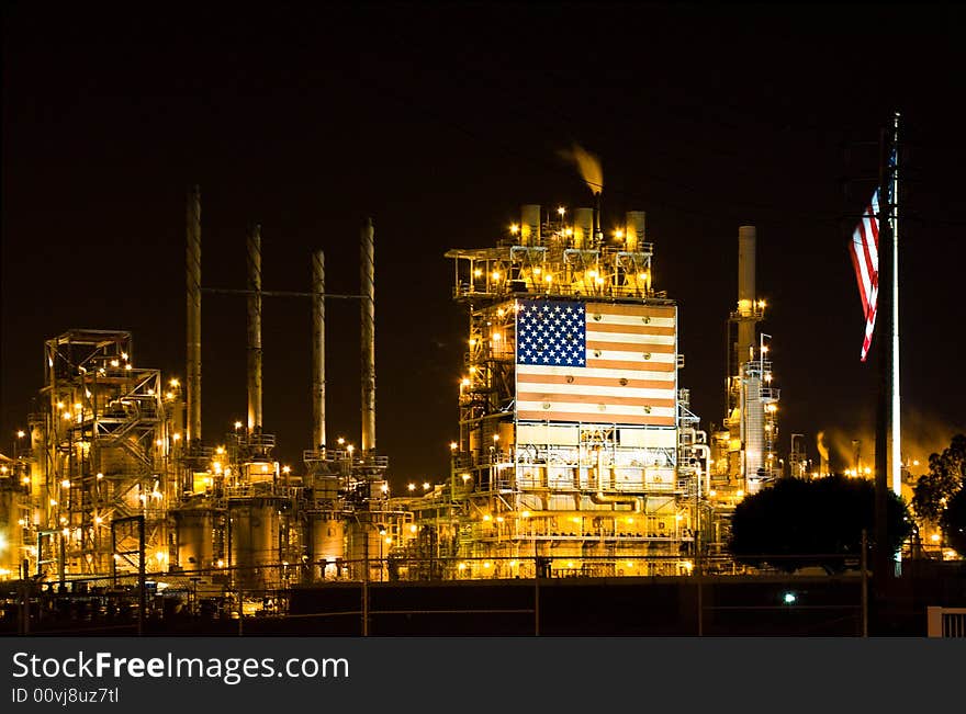 Picture of a lighted up factory at the night. Picture of a lighted up factory at the night