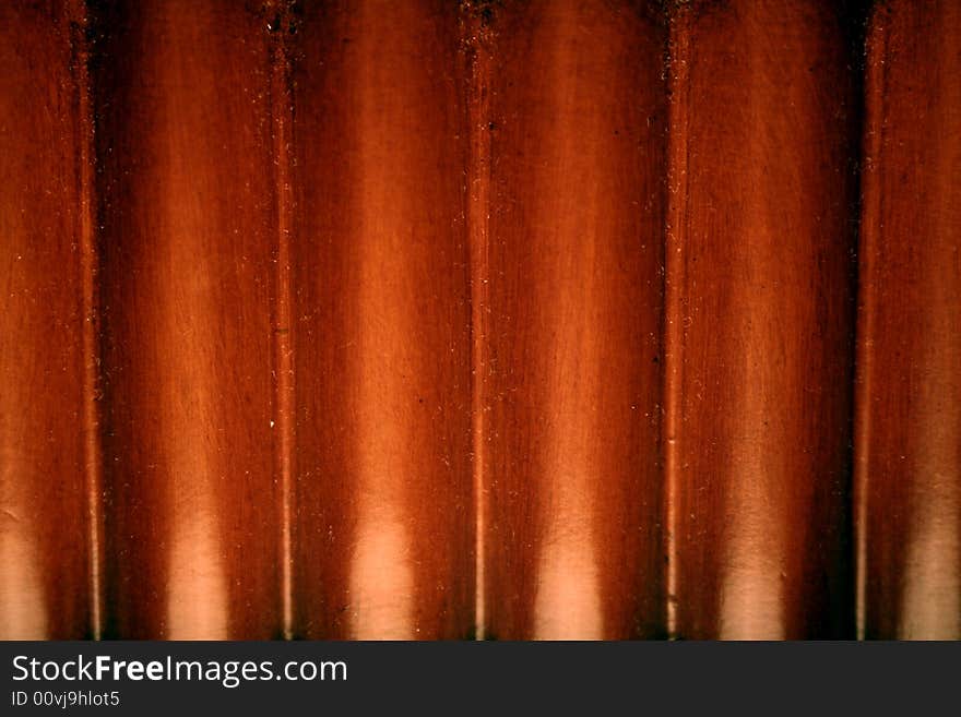 A close-up of a red wooden background. A close-up of a red wooden background.