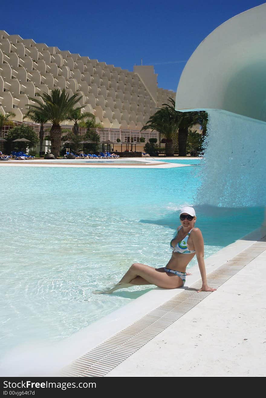 Beauty girl in the pool of SPA resort, Canaries island. Beauty girl in the pool of SPA resort, Canaries island