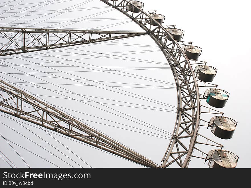 The great supporting steel truss of a Ferris wheel. The great supporting steel truss of a Ferris wheel.