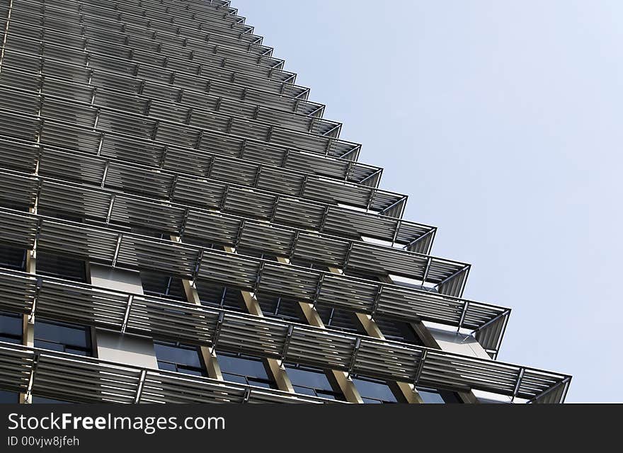 Which way is up? A shot of a modern building exterior. Which way is up? A shot of a modern building exterior.