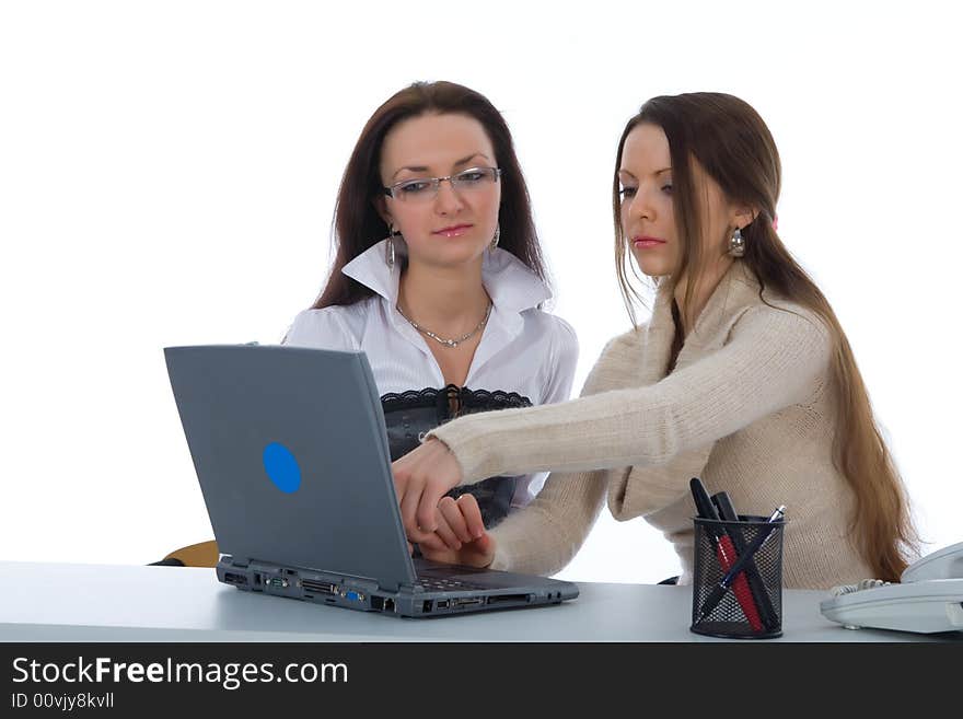 Two business woman work with laptop