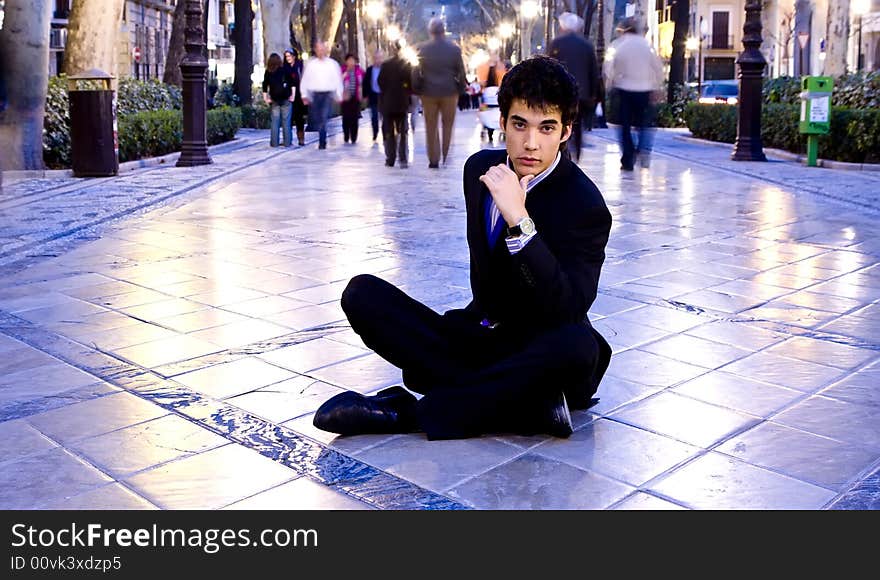 Businessman portrait in urban background.