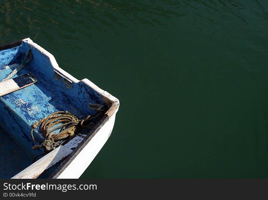 Boat detail in green deep waters