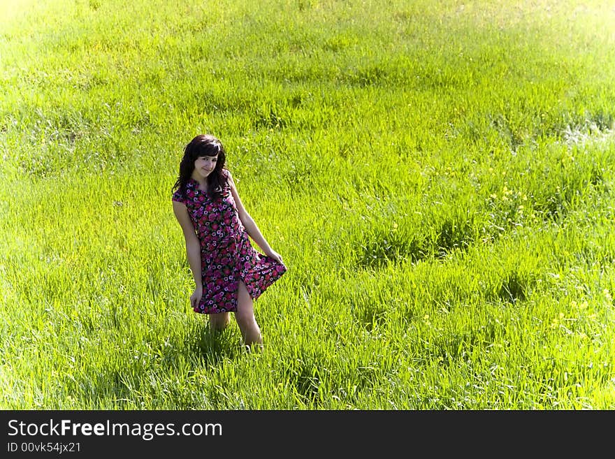 Cheerful young woman surrounded by nature. Cheerful young woman surrounded by nature.